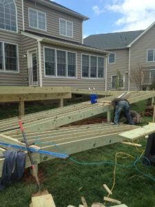 Haymarket deck builder creating wheelchair ramp